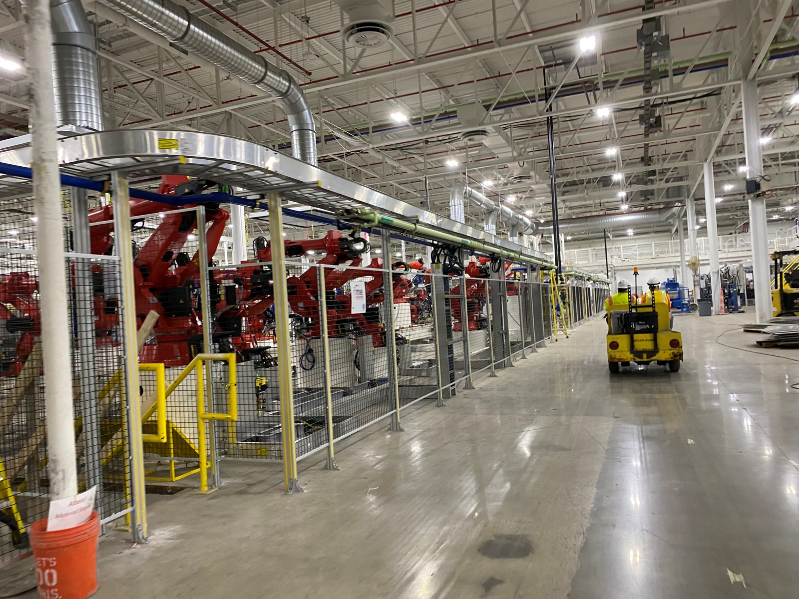 Robotic production line inside a connected manufacturing plant